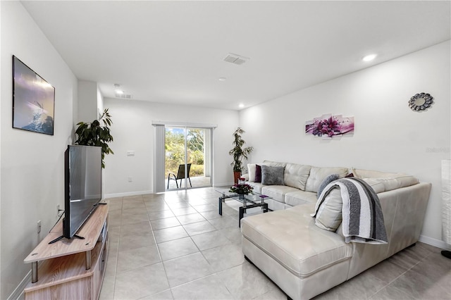 living room featuring light tile patterned flooring