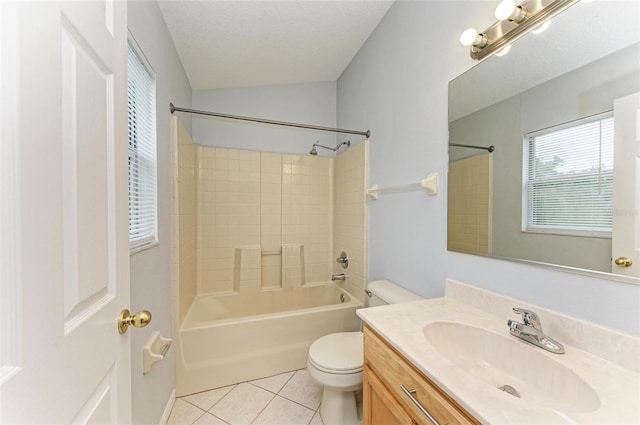 full bathroom with tile patterned floors, a textured ceiling, toilet, vanity, and shower / bathtub combination