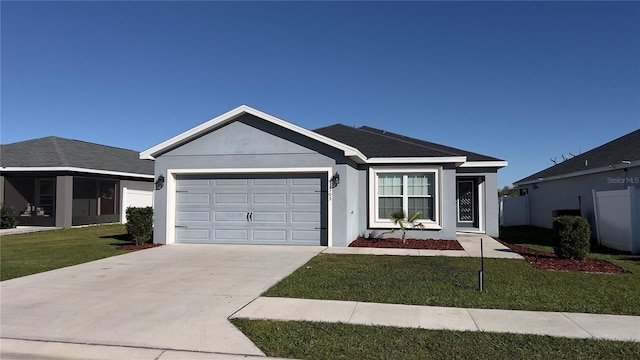 ranch-style home with a garage and a front yard