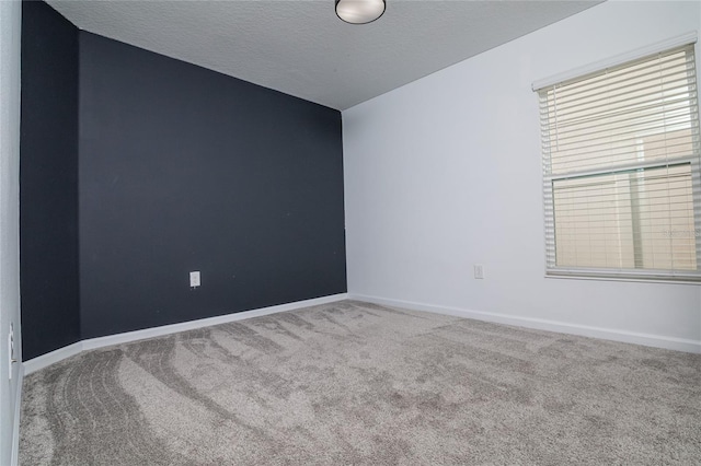 empty room with carpet floors