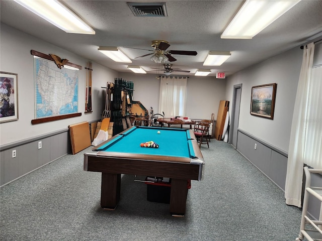 game room with a textured ceiling, billiards, dark carpet, and ceiling fan