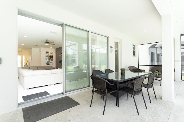 interior space featuring ceiling fan