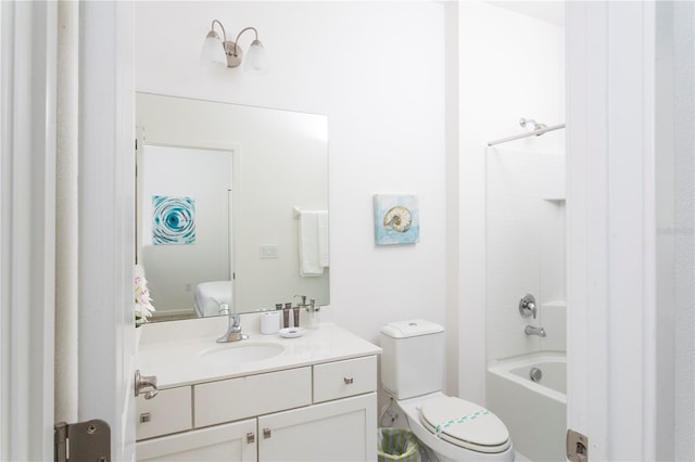 full bathroom featuring toilet, vanity, and washtub / shower combination