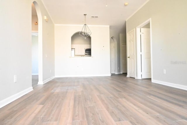 spare room with hardwood / wood-style floors