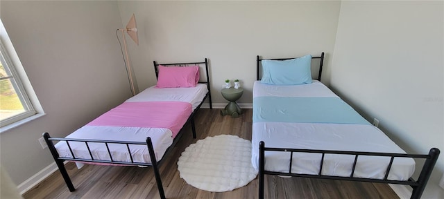 bedroom featuring hardwood / wood-style flooring