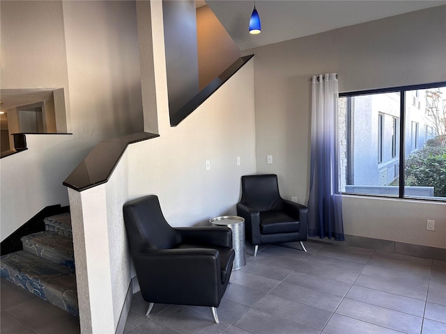 interior space with tile flooring and a wealth of natural light