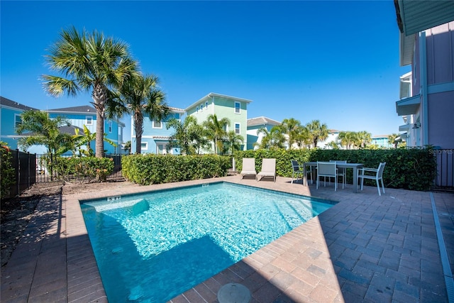 view of pool featuring a patio area