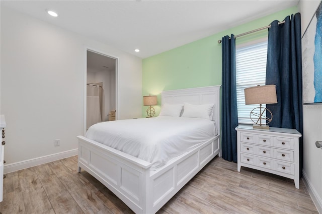 bedroom featuring light hardwood / wood-style floors