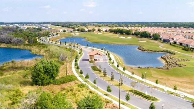 bird's eye view with a water view