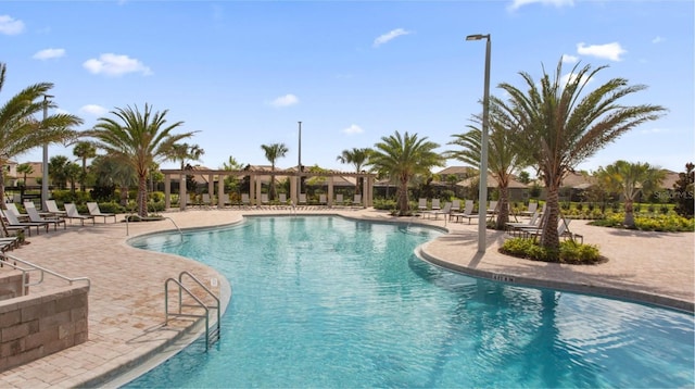 view of pool featuring a patio