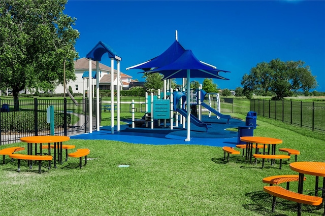 view of jungle gym with a yard