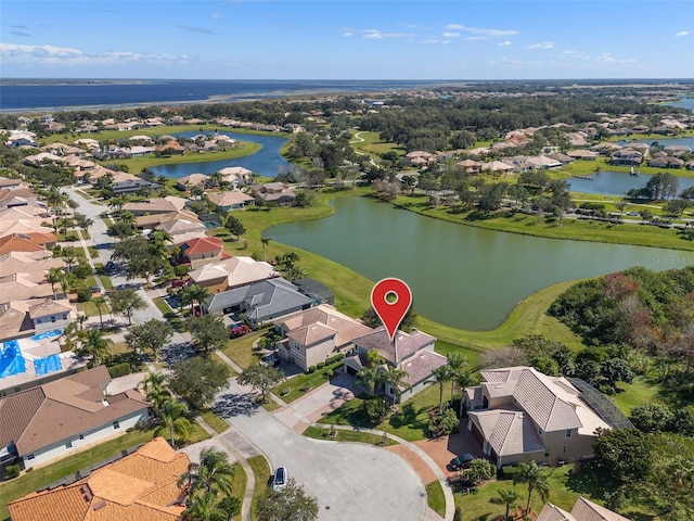 birds eye view of property featuring a water view