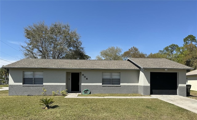 ranch-style home featuring a garage and a front yard