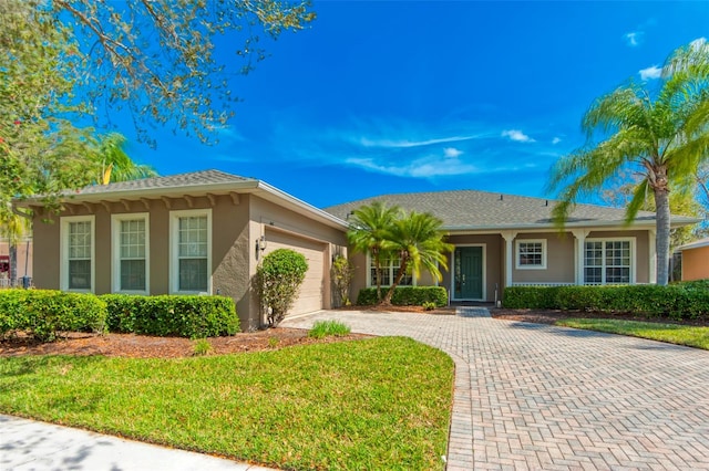 single story home with a garage