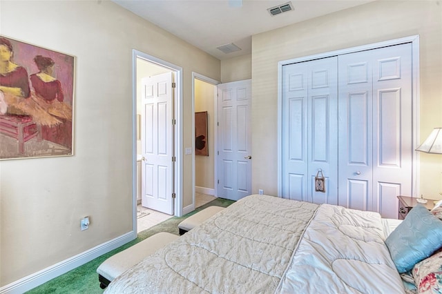 carpeted bedroom with a closet