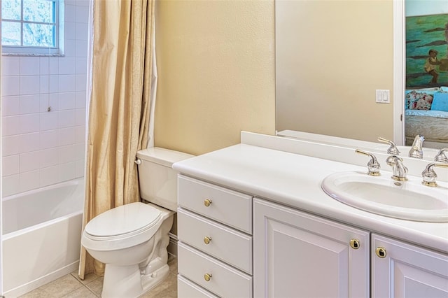 full bathroom featuring tile floors, toilet, vanity, and shower / bath combo with shower curtain