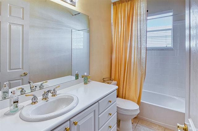 full bathroom featuring tile flooring, shower / tub combo with curtain, vanity with extensive cabinet space, and toilet