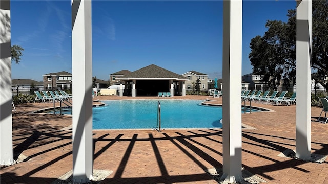 view of pool featuring a patio