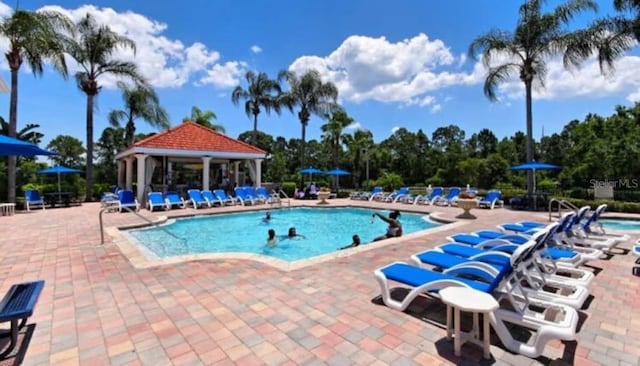 view of pool with a gazebo and a patio area
