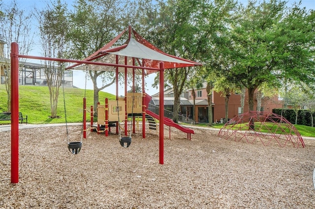 view of playground featuring a lawn