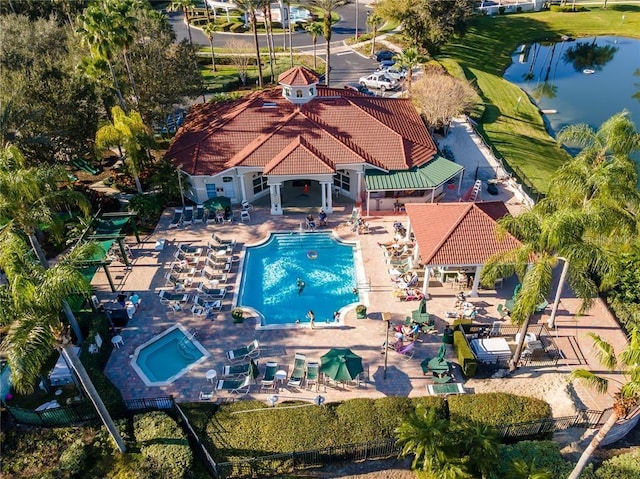 view of pool with a water view
