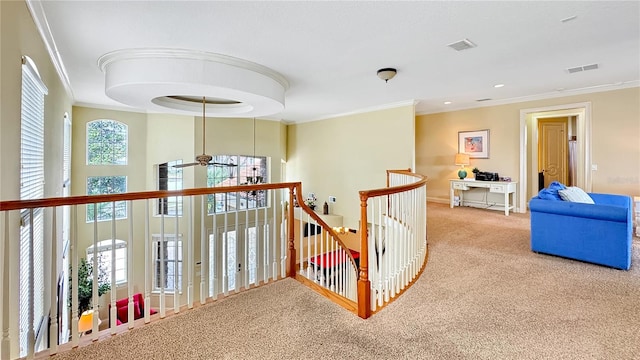 corridor featuring light colored carpet and ornamental molding