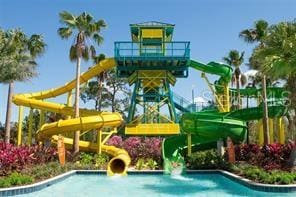 view of swimming pool featuring a water slide