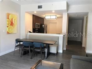 dining room featuring dark hardwood / wood-style floors