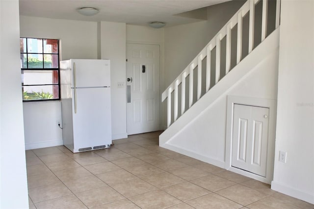 view of tiled entrance foyer