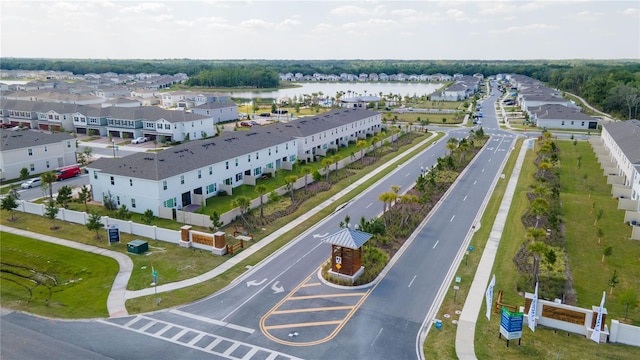 aerial view with a residential view and a water view