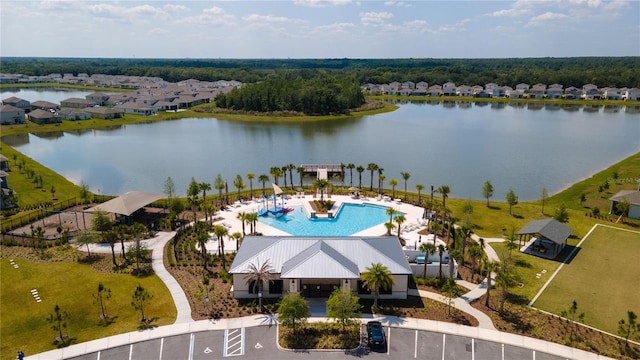 drone / aerial view with a water view