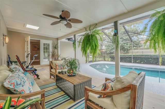 exterior space featuring outdoor lounge area, a lanai, ceiling fan, and a patio