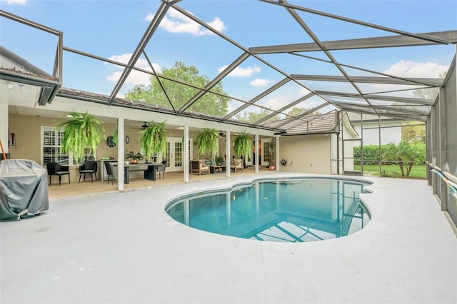 view of pool featuring a patio area, grilling area, and a lanai