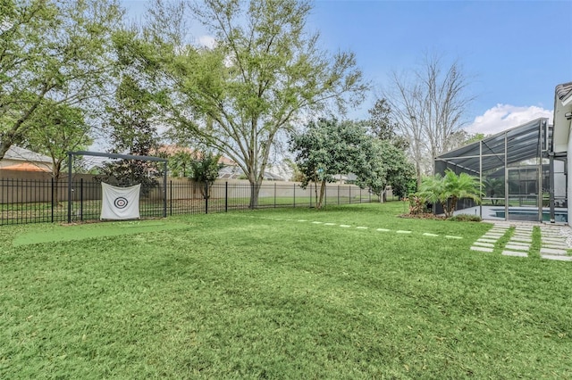 view of yard featuring a lanai