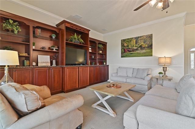 living room featuring ceiling fan, light colored carpet, and crown molding