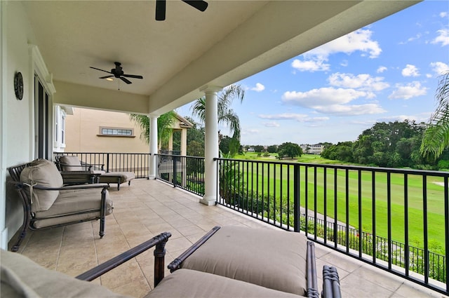 balcony featuring ceiling fan