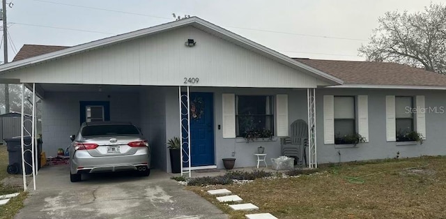 view of front of house with a carport