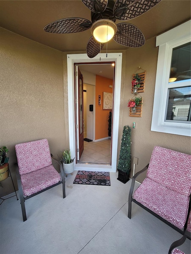 entrance to property with stucco siding