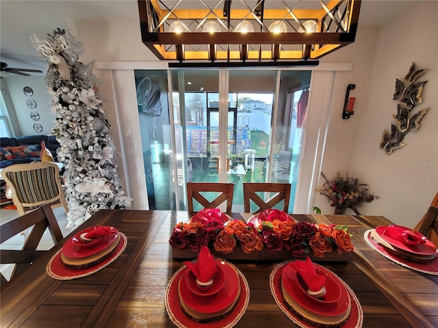 dining room featuring ceiling fan