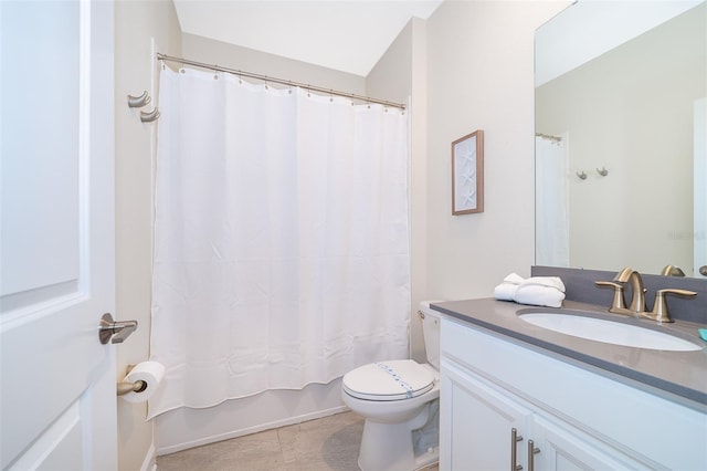 full bathroom with shower / bath combination with curtain, toilet, tile floors, and vanity