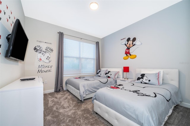 bedroom featuring carpet floors and lofted ceiling