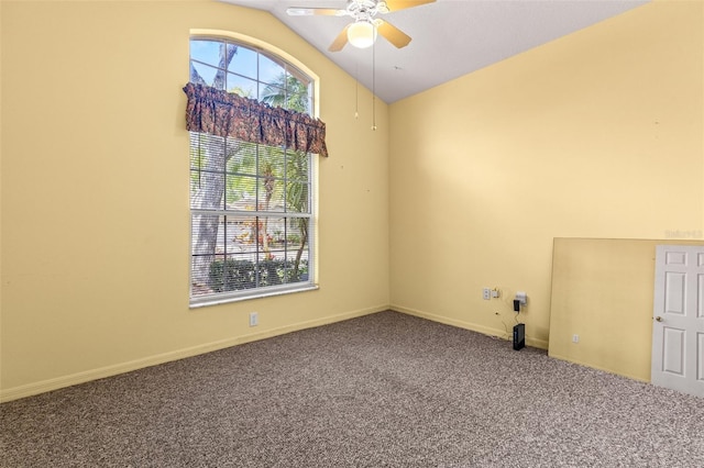 carpeted empty room with lofted ceiling and ceiling fan