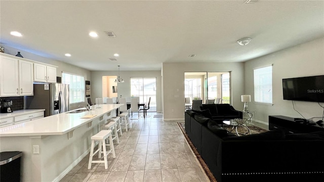 tiled living room with sink