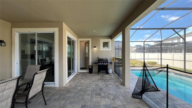 unfurnished sunroom with a swimming pool