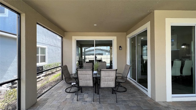 sunroom with plenty of natural light