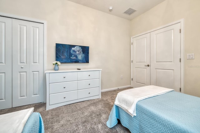 bedroom with light colored carpet