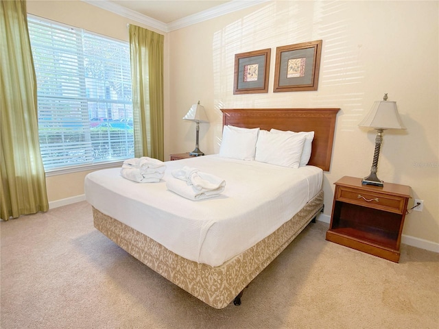 carpeted bedroom featuring ornamental molding