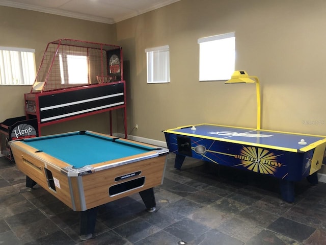 recreation room featuring crown molding