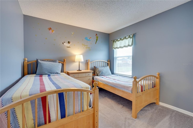 carpeted bedroom with a textured ceiling