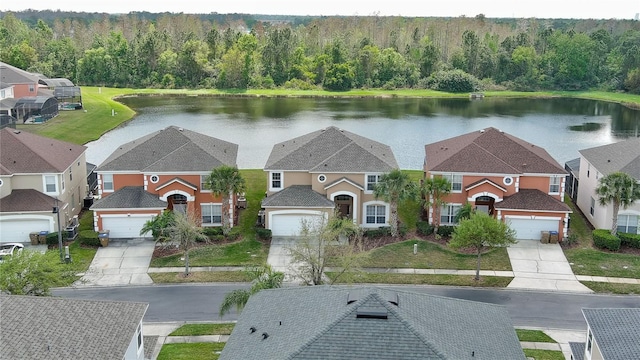 drone / aerial view featuring a water view